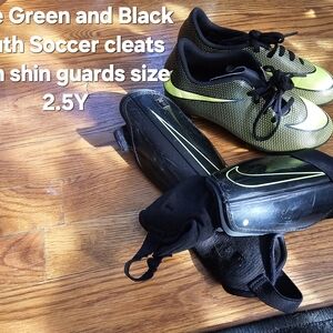 Green and Black Youth Soccer Cleats with Shin Guards